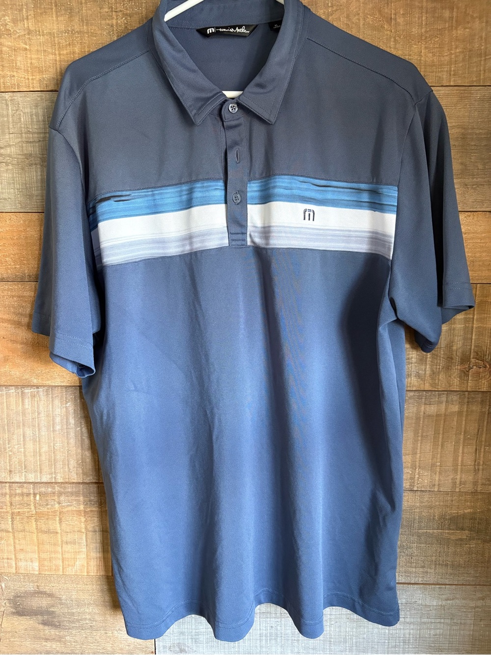 Travis Mathew Slate Blue Polo with Light Blue and White Stripes